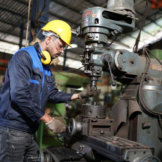 Saint-Gobain employees collaborating at a facility for manufacturing and operation jobs near Atlanta, GA.