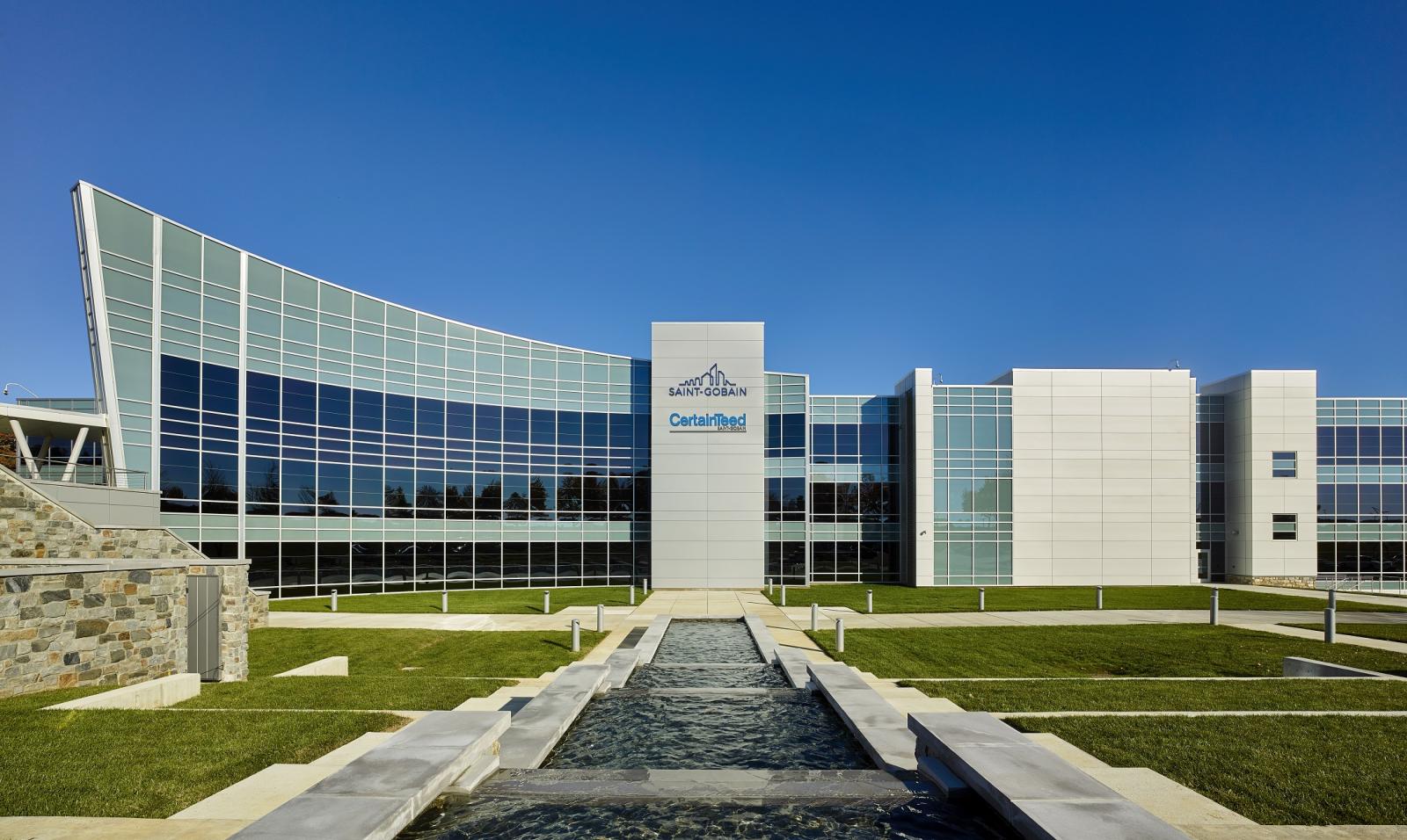 Corporate office building with Saint-Gobain and CertainTeed logos in the center