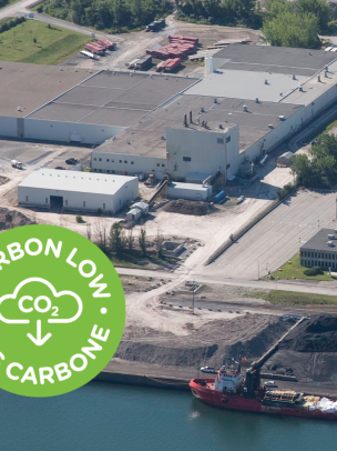 Aerial view on Montreal plant with a green logo that says Carbon Low